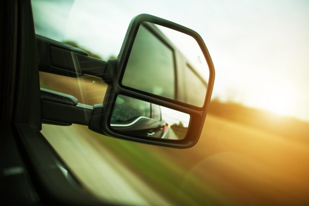 looking in rearview mirror
