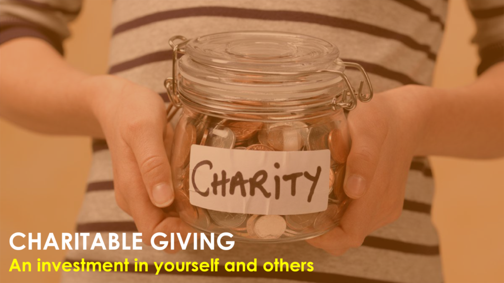 holding jar of money with charity note on front